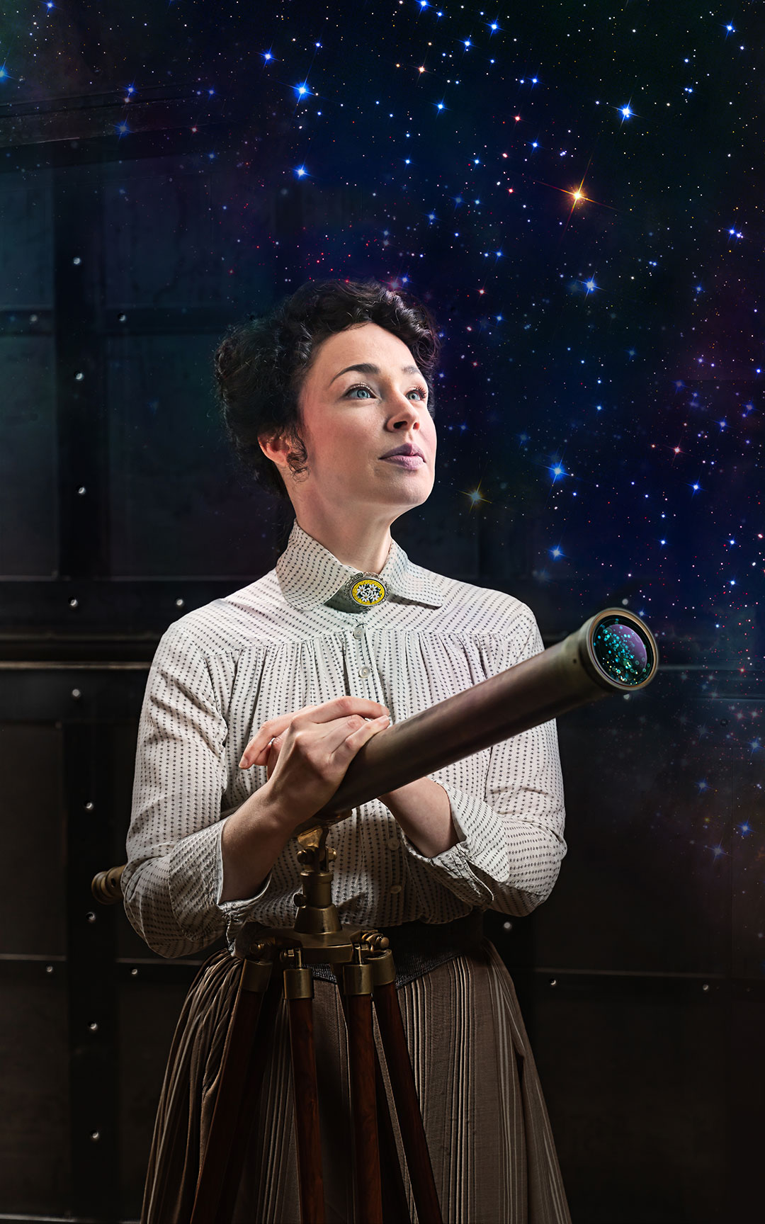 Laura C. Harris portraying Henrietta Swan Leavitt beside a telescope in Silent Sky